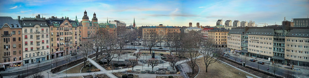 High angle view of buildings in city against sky