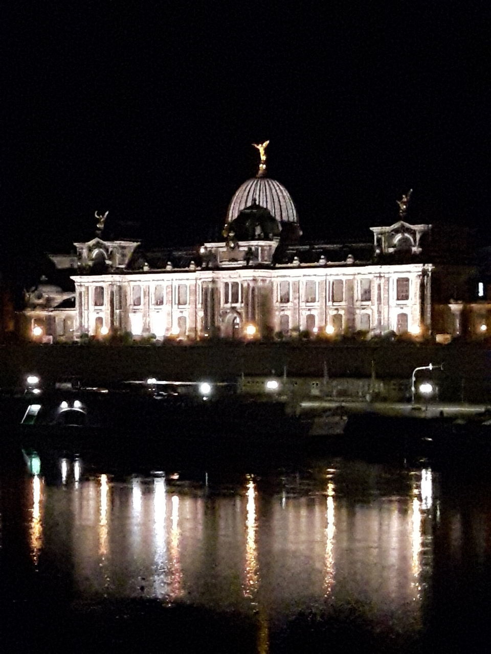 ILLUMINATED BUILDING AT NIGHT