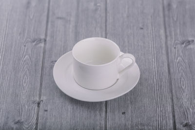 High angle view of coffee cup on table