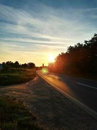 Road against sky during sunset