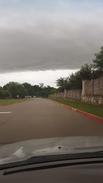 Road seen through car windshield