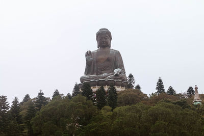 Low angle view of statue against clear sky