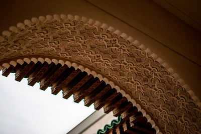 Low angle view of carving on wall