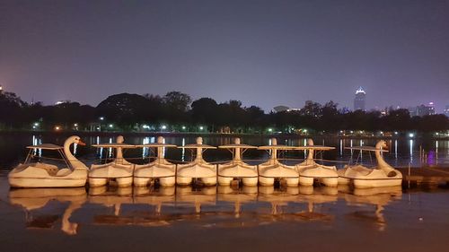 Reflection of illuminated lights in water at night