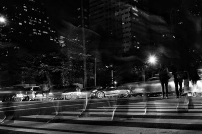 Cars on road at night