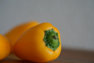 Close-up of orange fruit on table