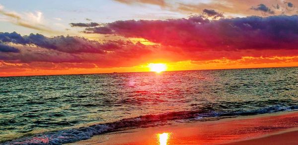 Scenic view of sea against sky during sunset