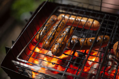 Close-up of meat on barbecue grill