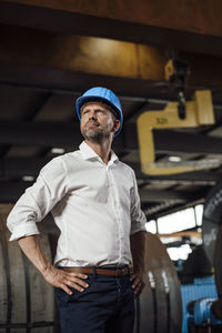 Man working with umbrella