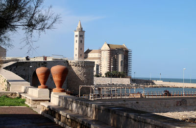 Trani,  italy, 4 december 2022, the cathedral and the fort  seen from the roof garden on the sea