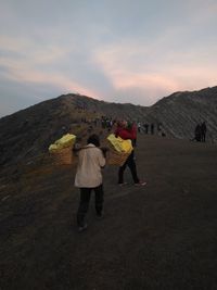 Woman standing on mountain landscape