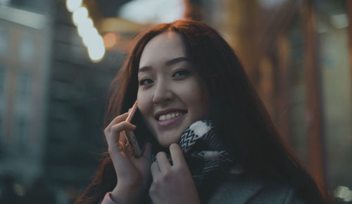 Young asian woman call with smartphone