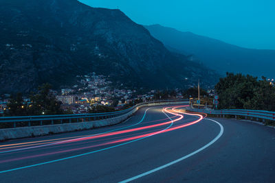 Light trails on highway road susa valley italy at night