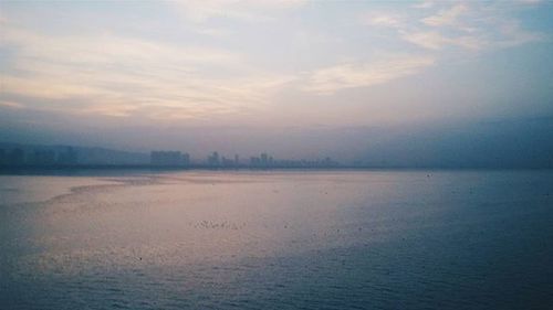 Scenic view of sea at sunset