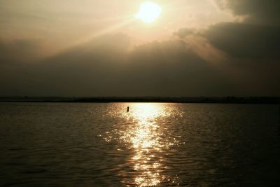 Scenic view of sunset over river