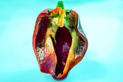 Close-up of fruit over white background