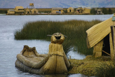 Boat moored on lake