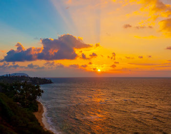 Scenic view of sea against sky during sunset