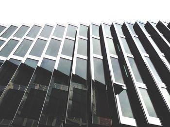 Low angle view of modern building against sky
