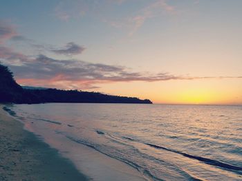 Scenic view of sea at sunset