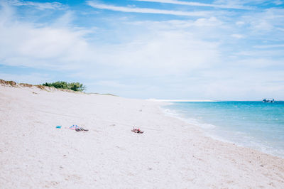 Scenic view of beach against sky