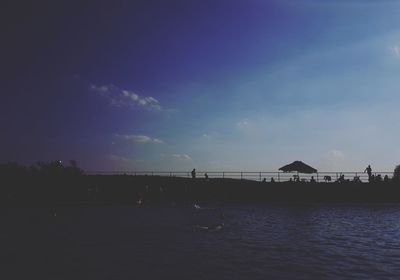 Scenic view of sea against sky at sunset
