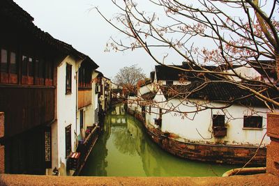 View of canal along buildings