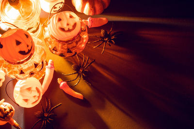 High angle view of illuminated lighting equipment on table