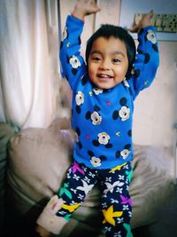 Portrait of cute baby girl at home