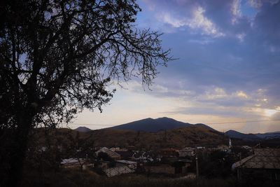 Scenic view of mountains against sky during sunset