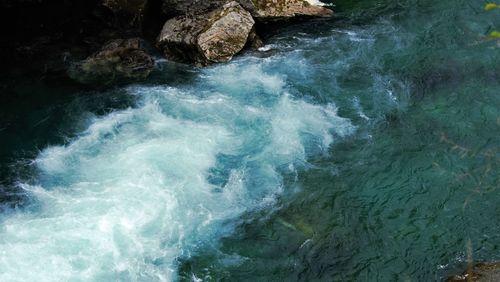 High angle view of rocks in sea