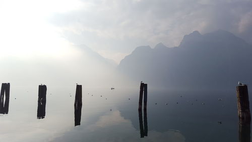 Scenic view of landscape against cloudy sky