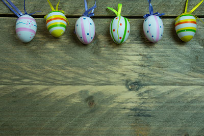 Close-up of multi colored lights hanging on wall