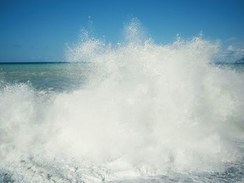 Waves splashing on rocks