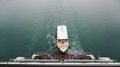 High angle view of ship sailing on sea