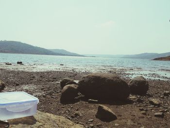 Scenic view of beach against clear sky