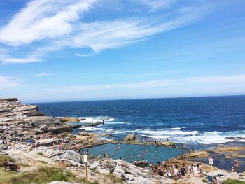 High angle view of sea against blue sky