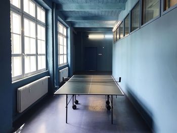 Empty tennis table in room