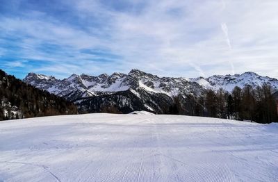 Snowcapped mountains against sky