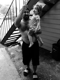 Full length of friends standing outdoors