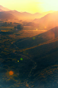 Scenic view of landscape against sky during sunset