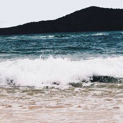 Scenic view of sea against clear sky