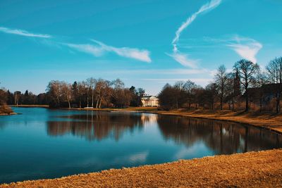 Scenic view of lake against blue sky