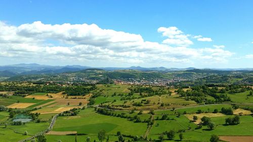 Aerial view of agricultural landscape against sky