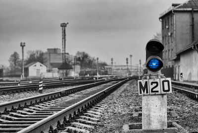 Train on railroad tracks against sky