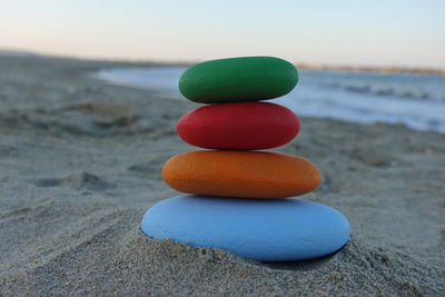 Stack of colored stones on the beach