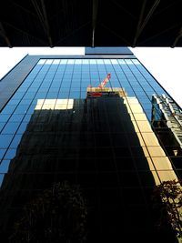 Low angle view of modern building against sky