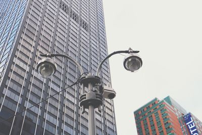 Low angle view of skyscraper against sky