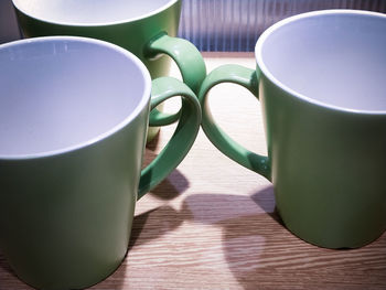 Close-up of coffee cup on table