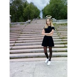 Young woman standing in park